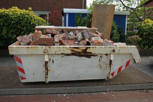 House clearance team removing furniture from a Beckenham home